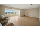 Bright living room with large windows showcasing water views at 5925 Shore S Blvd # 611, Gulfport, FL 33707
