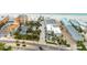 Beachfront properties with multiple units, lush landscaping, and parking, offering easy access to the beach at 619 2Nd St # 3, Indian Rocks Beach, FL 33785