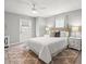 Comfortable bedroom featuring a ceiling fan, neutral walls, and a well-coordinated décor, creating a calm and relaxing space at 619 2Nd St # 3, Indian Rocks Beach, FL 33785