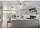 Open-concept living room seamlessly connecting to the dining area and kitchen, perfect for entertaining at 619 2Nd St # 3, Indian Rocks Beach, FL 33785