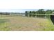 Spacious fenced backyard offering privacy and a great view of the adjacent pond at 7721 Twin Leaf Ter, Parrish, FL 34219