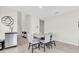 Dining room featuring modern furnishings, a beverage cooler, and neutral paint at 7721 Twin Leaf Ter, Parrish, FL 34219
