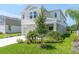 Charming two-story home with manicured lawn and well-maintained landscaping at 7721 Twin Leaf Ter, Parrish, FL 34219