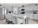 Modern kitchen with quartz countertops and stainless steel appliances at 7721 Twin Leaf Ter, Parrish, FL 34219