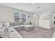 Spacious upstairs living room with comfortable seating and plenty of natural light at 7721 Twin Leaf Ter, Parrish, FL 34219