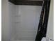 Bathroom with a white shower/tub combo behind a patterned shower curtain at 8255 Richmond St, Gibsonton, FL 33534