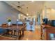 Spacious kitchen features stainless steel appliances, pendant lighting, and breakfast bar at 8304 Aquila St, Port Richey, FL 34668