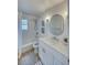 Bathroom featuring modern white fixtures, including a bath tub and updated vanity at 8635 Boca Ciega Dr, St Pete Beach, FL 33706