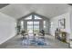 Bright living room with water views, modern furnishings, and a welcoming atmosphere at 8635 Boca Ciega Dr, St Pete Beach, FL 33706