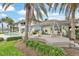 Backyard with deck, swing, and pool at 892 Harbor Is, Clearwater Beach, FL 33767