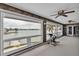 Bedroom with bay view and ceiling fan at 892 Harbor Is, Clearwater Beach, FL 33767