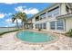 Beautiful backyard with an in-ground pool and waterfront views and direct access at 892 Harbor Is, Clearwater Beach, FL 33767