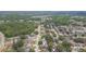 Aerial view of a suburban neighborhood near a green wooded area at 9112 Calle Alta, New Port Richey, FL 34655