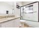 Clean bathroom with granite countertop, updated shower, and modern fixtures at 9112 Calle Alta, New Port Richey, FL 34655