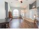 Inviting living room with high ceilings, wood floors, and plenty of natural light at 9112 Calle Alta, New Port Richey, FL 34655