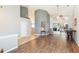 Spacious living room boasts wood floors, high ceilings, and access to the outdoor area at 9112 Calle Alta, New Port Richey, FL 34655