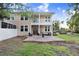 Spacious backyard with patio seating and lush greenery, perfect for outdoor activities at 923 Lumsden Reserve Dr, Brandon, FL 33511