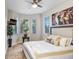 Inviting bedroom with large windows, neutral carpet, and stylish decor for comfort at 923 Lumsden Reserve Dr, Brandon, FL 33511