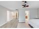 Spacious primary bedroom featuring neutral walls, wood floors and an ensuite bathroom at 923 Lumsden Reserve Dr, Brandon, FL 33511