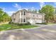 Inviting townhome featuring manicured lawns and a two-car garage at 923 Lumsden Reserve Dr, Brandon, FL 33511