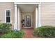 Charming entrance with a decorative glass door and brick pathway at 923 Lumsden Reserve Dr, Brandon, FL 33511