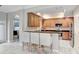 Modern kitchen featuring a breakfast bar and stainless steel appliances at 923 Lumsden Reserve Dr, Brandon, FL 33511