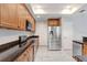 Well-equipped kitchen with stainless steel fridge and sleek countertops at 923 Lumsden Reserve Dr, Brandon, FL 33511
