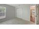 Bedroom with window and neutral carpet floor at 9403 N 13Th St, Tampa, FL 33612