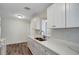 Beautiful kitchen with stainless sink, ample cabinet space, and a clean, modern aesthetic at 9403 N 13Th St, Tampa, FL 33612