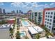 Condo building with pool, patios, and city view at 1120 E Kennedy Blvd # 1228, Tampa, FL 33602
