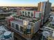 High-rise condo building featuring a rooftop pool and stunning city views at sunset at 1120 E Kennedy Blvd # 1228, Tampa, FL 33602