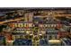 Luxury apartment buildings with rooftop pools and well-lit streets at night at 1120 E Kennedy Blvd # 1228, Tampa, FL 33602