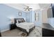 Serene bedroom with soft blue walls, a comfortable bed, and ample natural light at 1120 E Kennedy Blvd # 1228, Tampa, FL 33602
