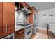 Well-equipped kitchen with stainless steel appliances and backsplash at 1120 E Kennedy Blvd # 1228, Tampa, FL 33602