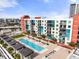 A beautiful rooftop condo pool with lounge chairs and city views at 1120 E Kennedy Blvd # 1228, Tampa, FL 33602
