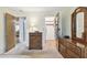 Bedroom with carpet, dresser, closet, and a door leading to the rest of the house at 11200 102Nd Ave # 48, Seminole, FL 33778