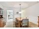 Dining area with view to bright kitchen area at 11200 102Nd Ave # 48, Seminole, FL 33778