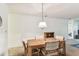 Dining area leading to living room area at 11200 102Nd Ave # 48, Seminole, FL 33778
