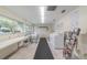 Bright laundry room with multiple washers and dryers for residents to utilize with ease at 11200 102Nd Ave # 48, Seminole, FL 33778