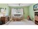 Living room has decorative curtains, light walls, and casual sofa at 11200 102Nd Ave # 48, Seminole, FL 33778