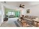 Inviting living room offers comfortable seating and lots of natural light at 11200 102Nd Ave # 48, Seminole, FL 33778
