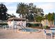 Relaxing hot tub area surrounded by lush landscaping and comfortable seating for residents at 11485 Oakhurst Rd # 312, Largo, FL 33774