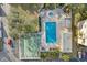 Aerial view of the community pool, bocce ball court, spa, and deck with lounge chairs at 11485 Oakhurst Rd # 312, Largo, FL 33774