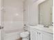 Bright bathroom with a vanity and shower-tub combo at 11541 Fountainhead Dr, Tampa, FL 33626