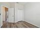 Cozy bedroom with closet and wood-look floors at 11541 Fountainhead Dr, Tampa, FL 33626