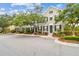 Charming townhome featuring a well-manicured lawn and neat landscaping that accentuates its curb appeal at 11541 Fountainhead Dr, Tampa, FL 33626