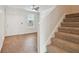 Inviting foyer with tiled floors and a staircase leading to the upper level at 11541 Fountainhead Dr, Tampa, FL 33626