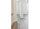 Hallway featuring luxury vinyl plank flooring at 11541 Fountainhead Dr, Tampa, FL 33626