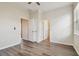 Spacious main bedroom featuring wood floors and two closets at 11541 Fountainhead Dr, Tampa, FL 33626