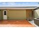 Exterior view of the home's private outdoor patio at 11541 Fountainhead Dr, Tampa, FL 33626